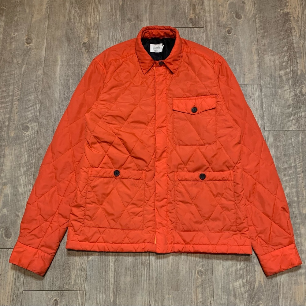 Vanishing Elephant Orange quilted jacket with black lining